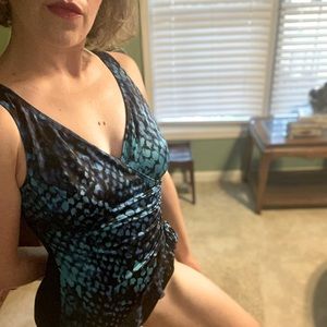 Black and blue, wrap-style one piece bathing suit